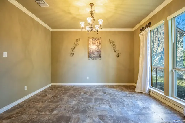 a view of a chandelier in a room