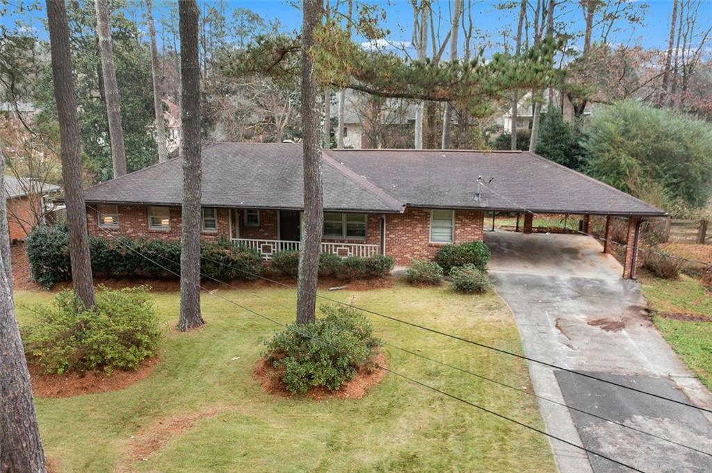 2033 Hollidon Road Decatur, GA 30033 - Photo 1 of 1 a backyard of a house with yard and outdoor seating