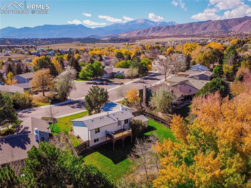 an aerial view of a house with a garden