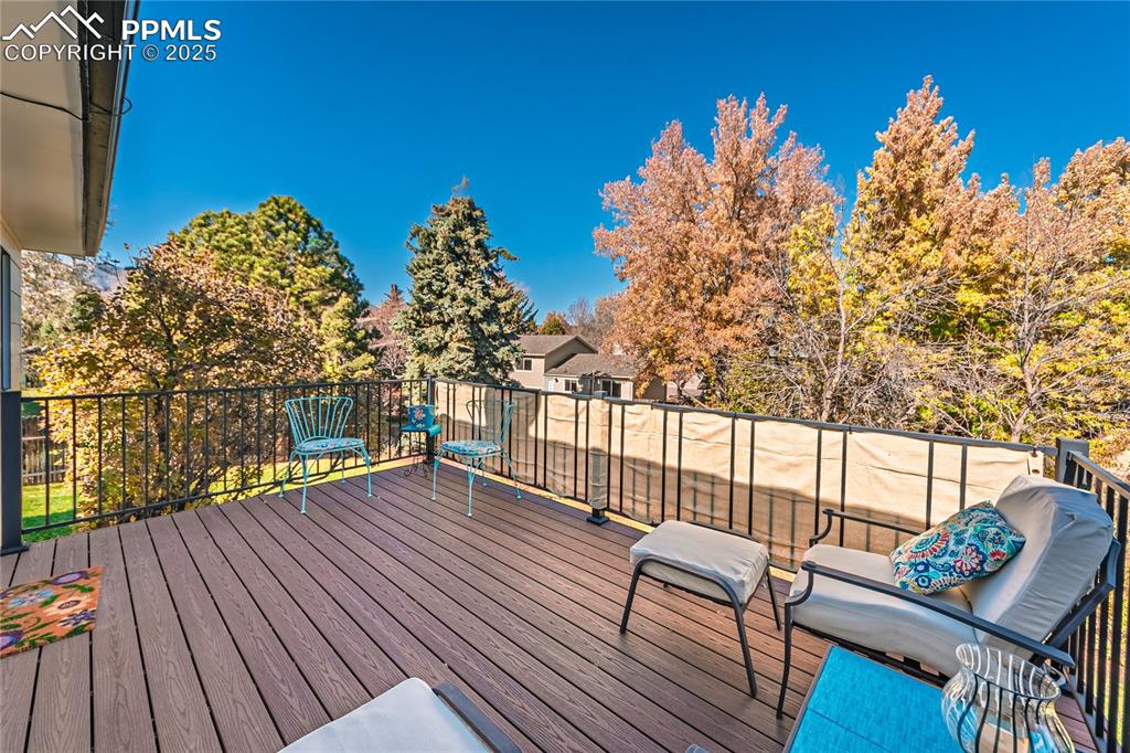 422 Saddlemountain Road Colorado Springs, CO 80919 - Photo 16 of 30 a view of a balcony with chairs