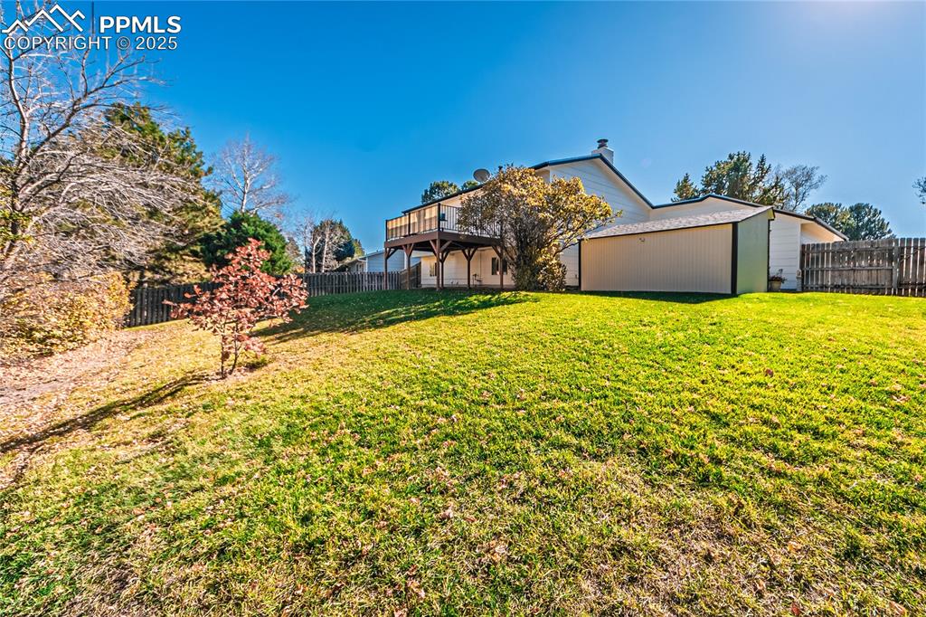 422 Saddlemountain Road Colorado Springs, CO 80919 - Photo 27 of 30 a house view with a yard