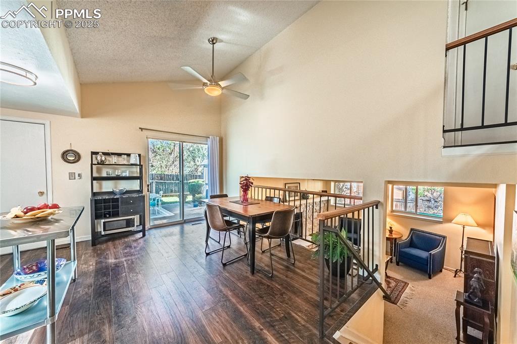 422 Saddlemountain Road Colorado Springs, CO 80919 - Photo 6 of 30 a view of a livingroom with furniture window and wooden floor