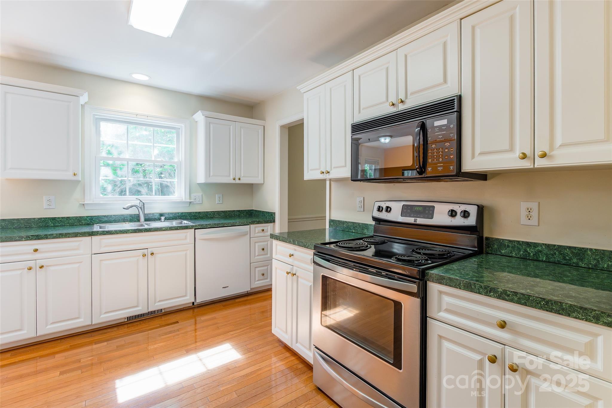 2177 Lookout Ridge Rock Hill, SC 29732 - Photo 14 of 46 a kitchen with granite countertop cabinets stainless steel appliances and a window