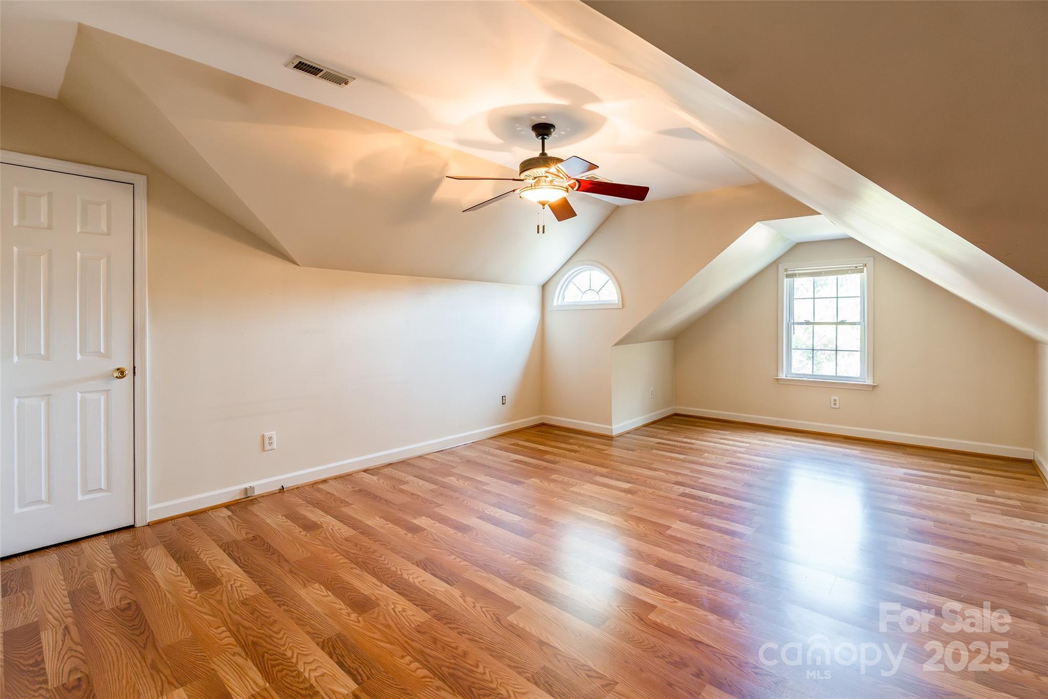 2177 Lookout Ridge Rock Hill, SC 29732 - Photo 24 of 34 a view of empty room with wooden floor and fan