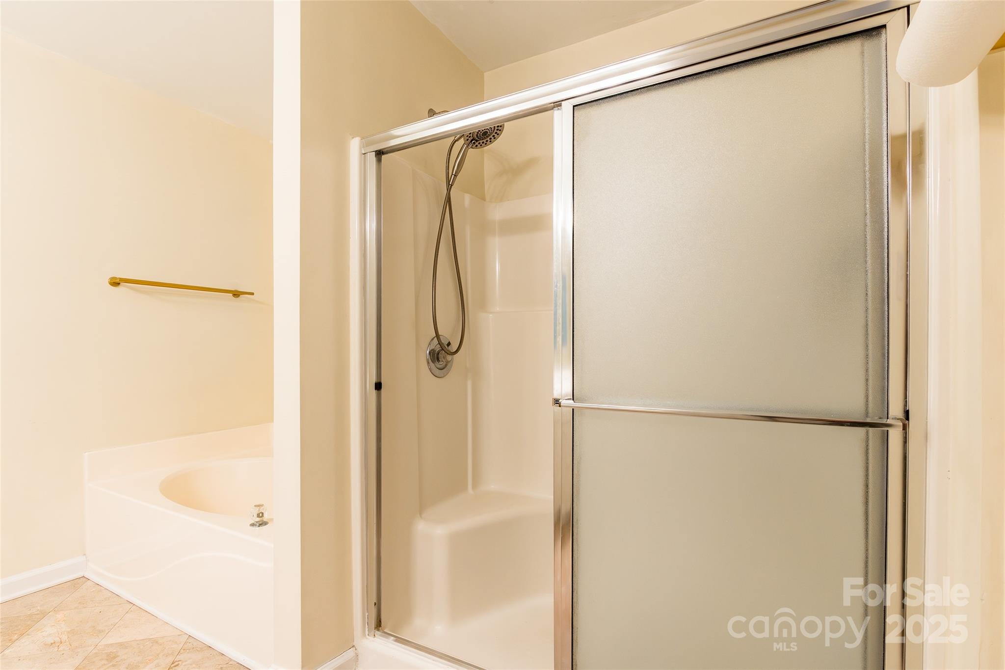 2177 Lookout Ridge Rock Hill, SC 29732 - Photo 34 of 34 a bathroom with a glass shower door