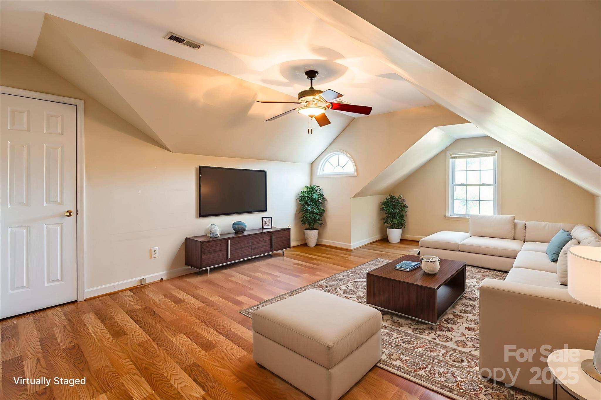 2177 Lookout Ridge Rock Hill, SC 29732 - Photo 35 of 46 a living room with furniture a flat screen tv and a window