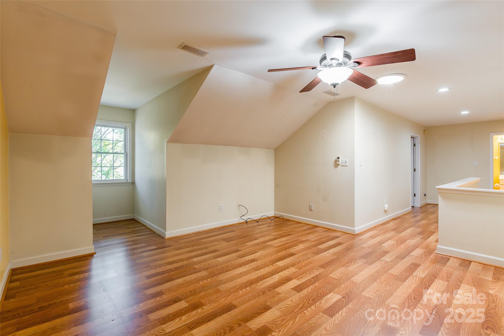 2177 Lookout Ridge Rock Hill, SC 29732 - Photo 38 of 46 a view of empty room with wooden floor and fan