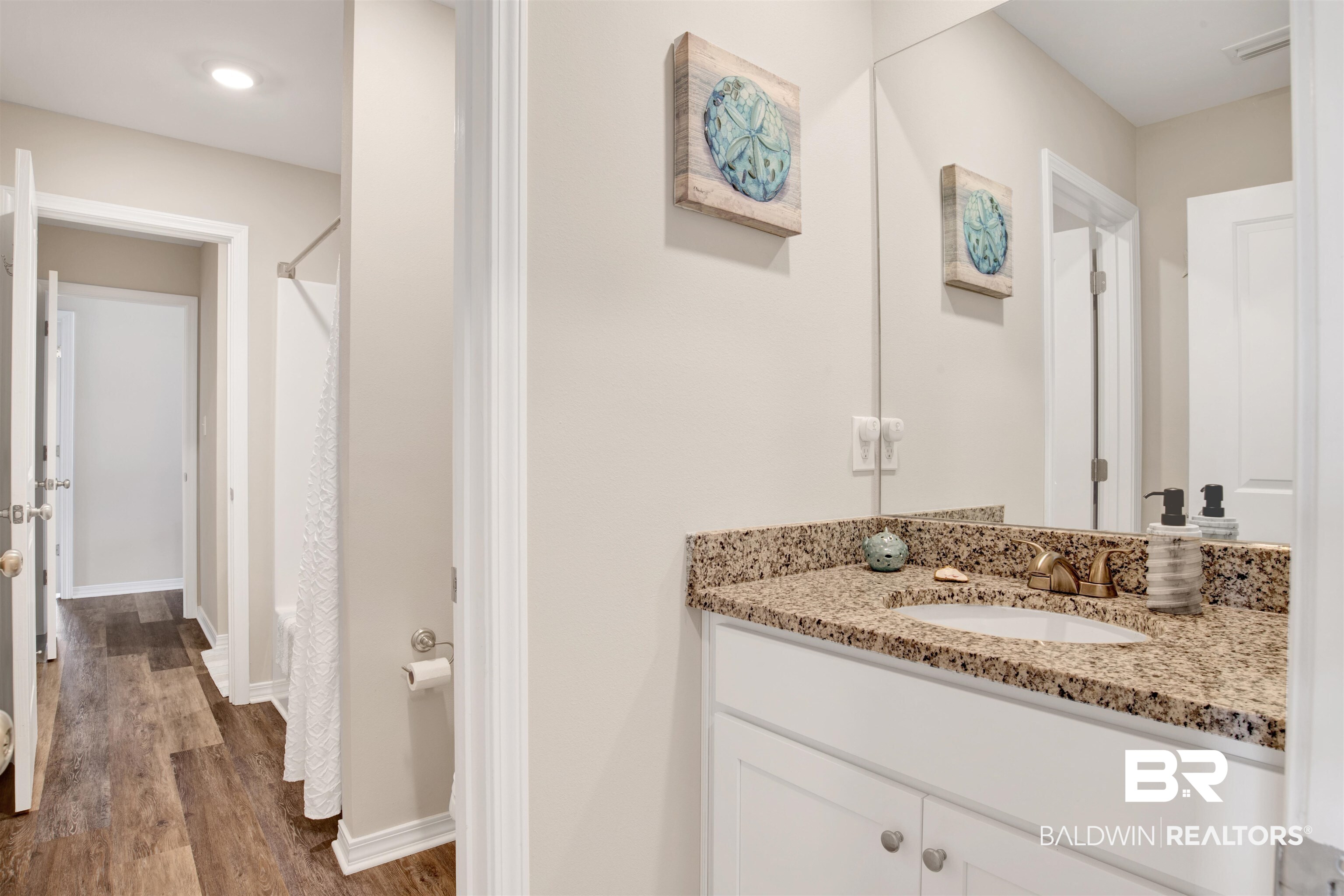 3097 Ingrid Lane Foley, AL 36535 - Photo 27 of 38 Bathroom featuring hardwood / wood-style flooring and vanity