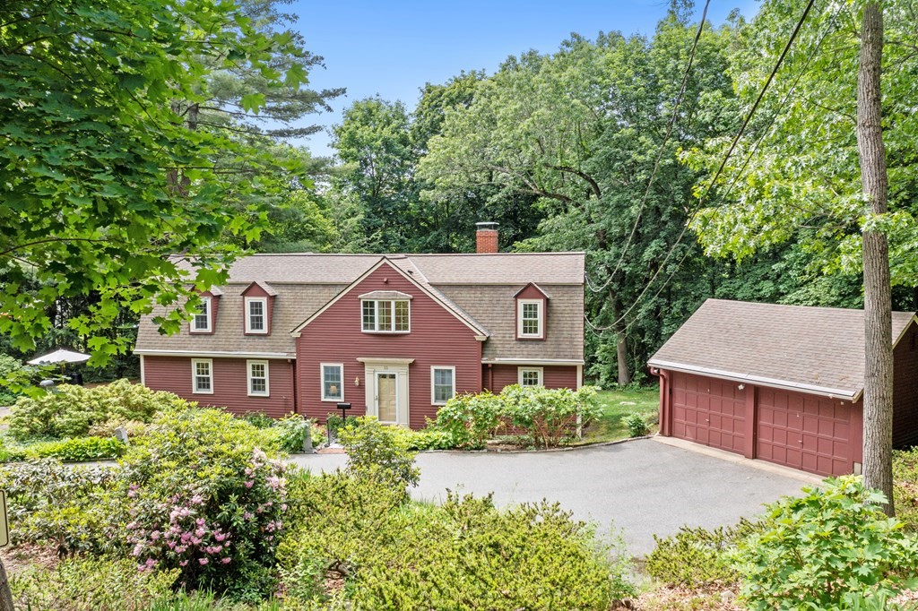23 Bennington Road Lexington, MA 02421 - Photo 1 of 42 front view of a house with a yard