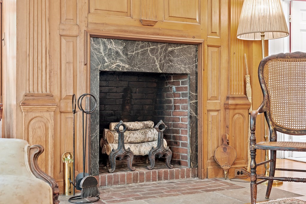 23 Bennington Road Lexington, MA 02421 - Photo 13 of 42 a front view of a house with wooden floor and a rug