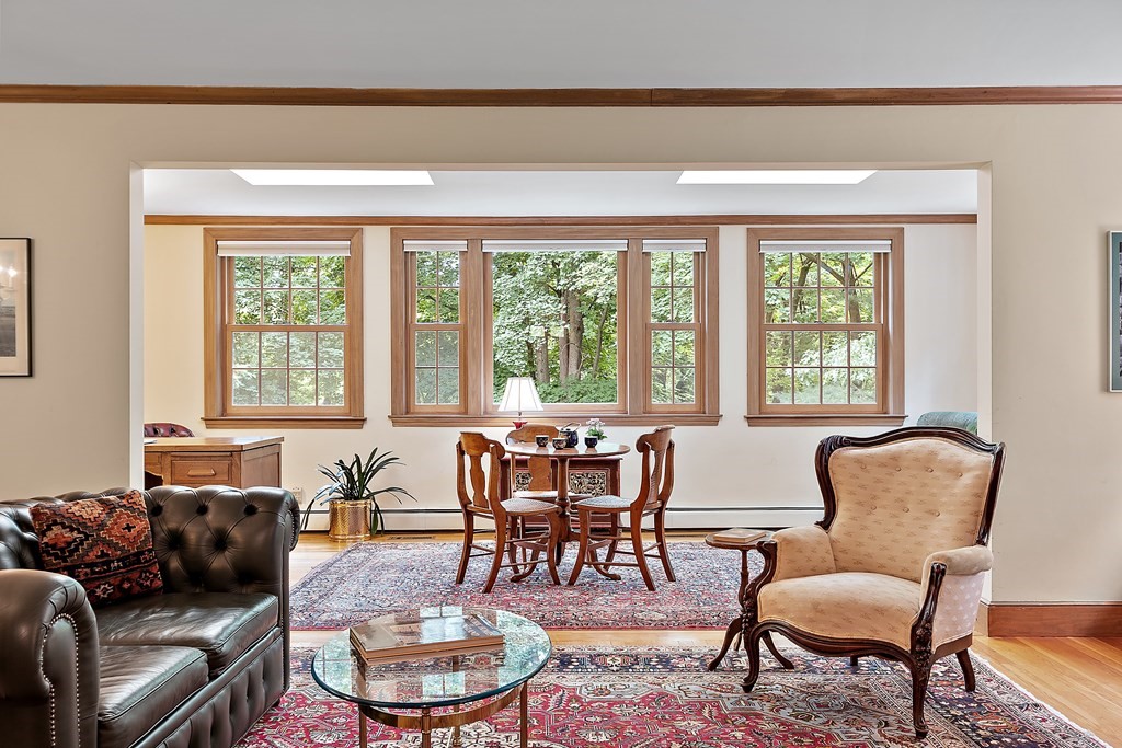 23 Bennington Road Lexington, MA 02421 - Photo 15 of 42 a living room with furniture and a large window