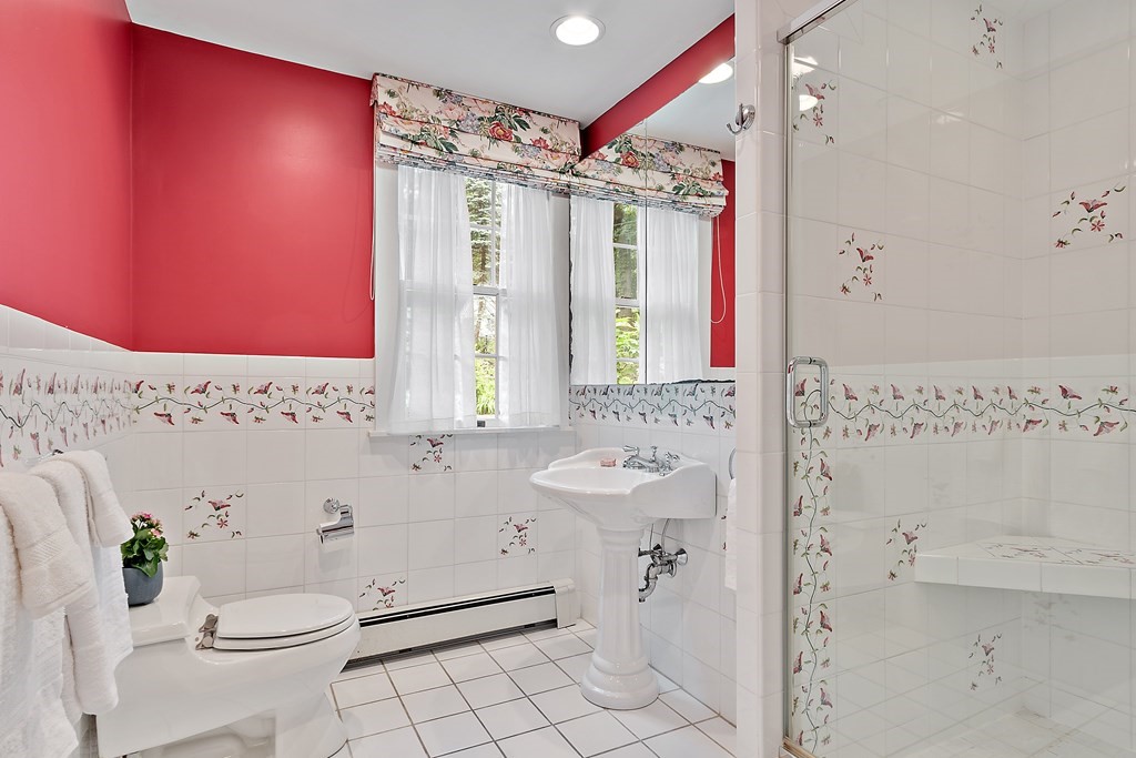 23 Bennington Road Lexington, MA 02421 - Photo 18 of 42 a bathroom with a sink toilet and shower