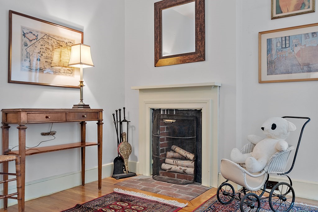 23 Bennington Road Lexington, MA 02421 - Photo 25 of 42 a living room with furniture and a fireplace