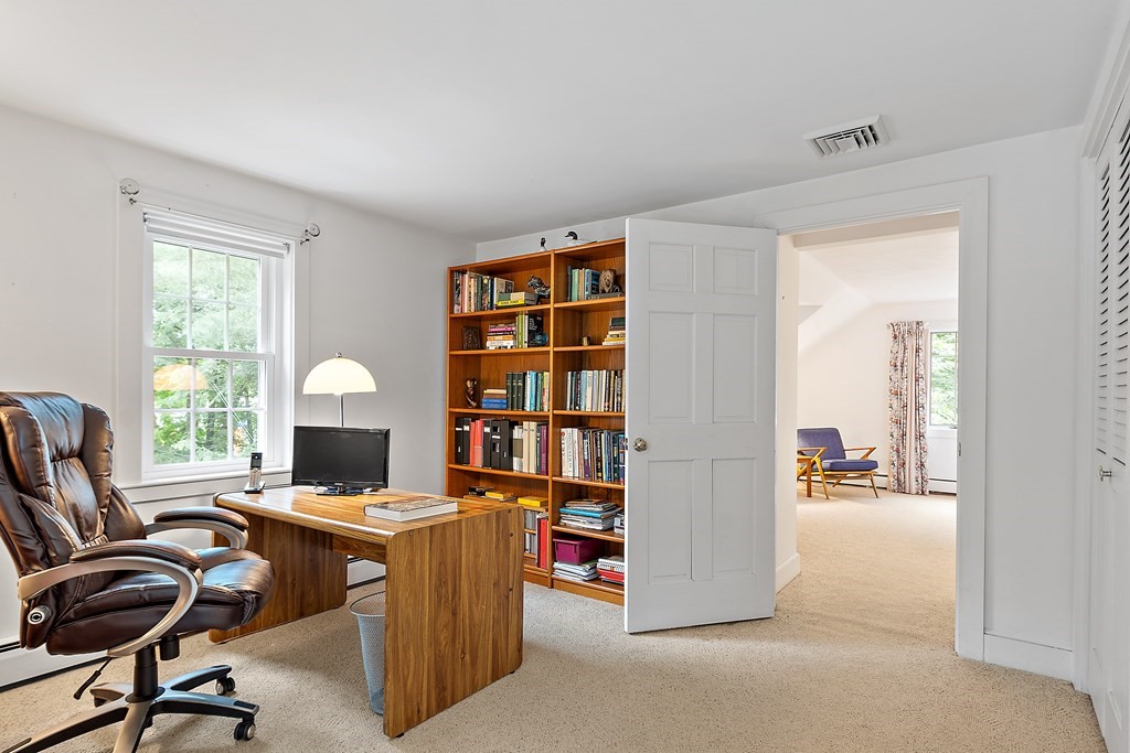23 Bennington Road Lexington, MA 02421 - Photo 28 of 42 a view of a workspace with furniture and a window