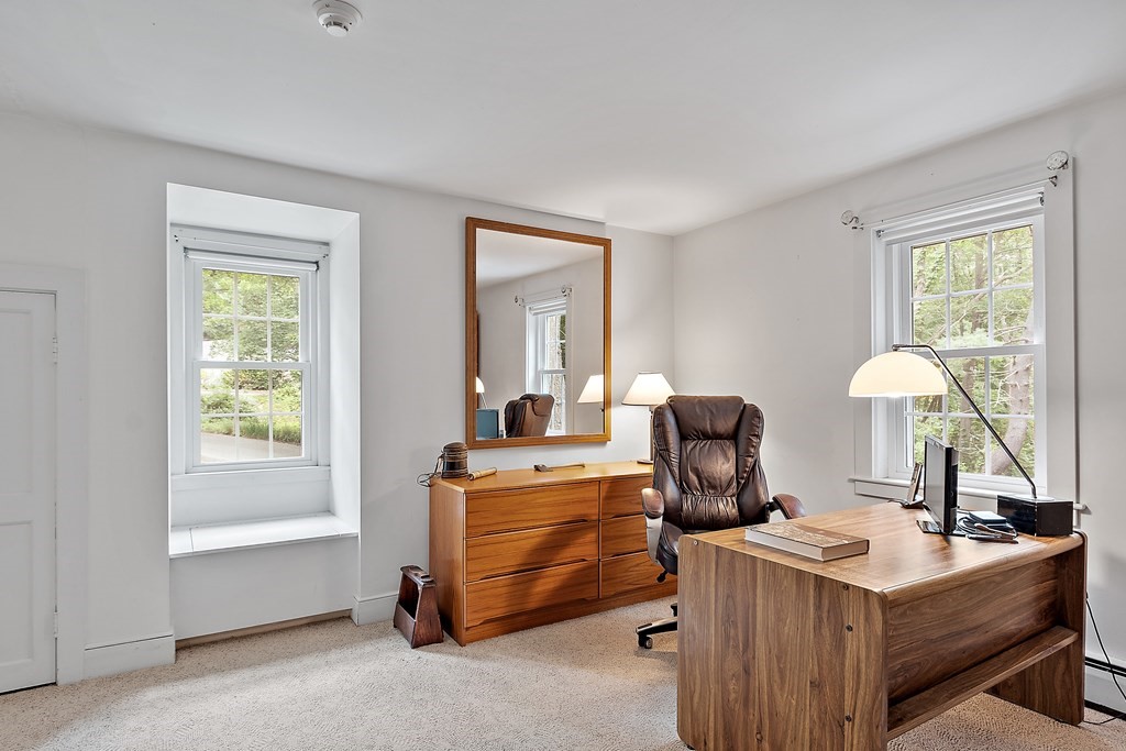 23 Bennington Road Lexington, MA 02421 - Photo 29 of 42 a bed room with a bed and a window