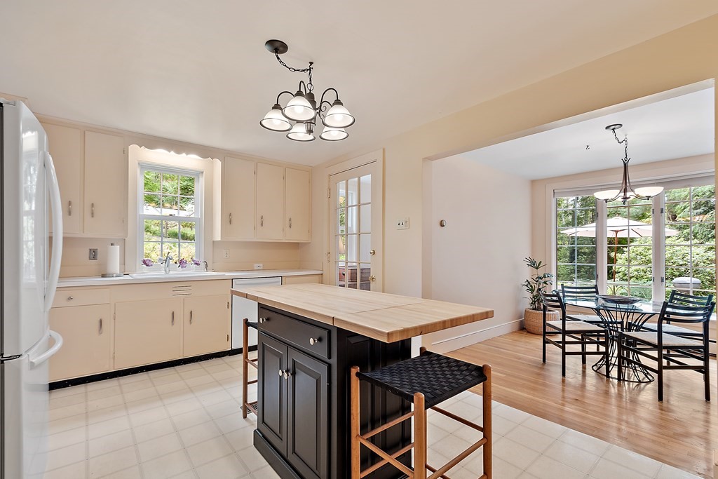 23 Bennington Road Lexington, MA 02421 - Photo 3 of 42 a view of a dining room with furniture window and outside view