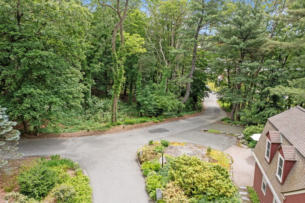 23 Bennington Road Lexington, MA 02421 - Photo 38 of 42 an aerial view of a house with a yard and large trees
