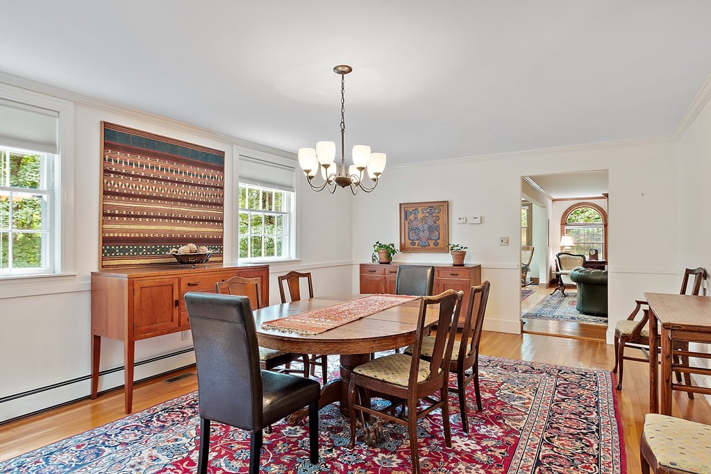 23 Bennington Road Lexington, MA 02421 - Photo 10 of 42 a view of a dining room with furniture window and wooden floor