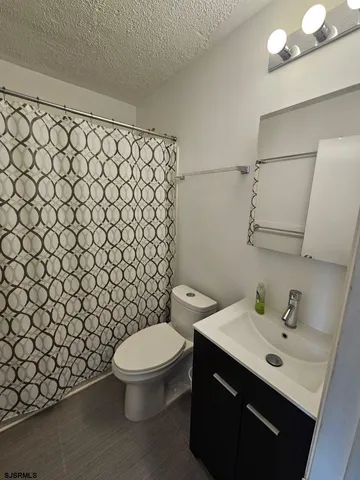 a bathroom with a sink and a toilet