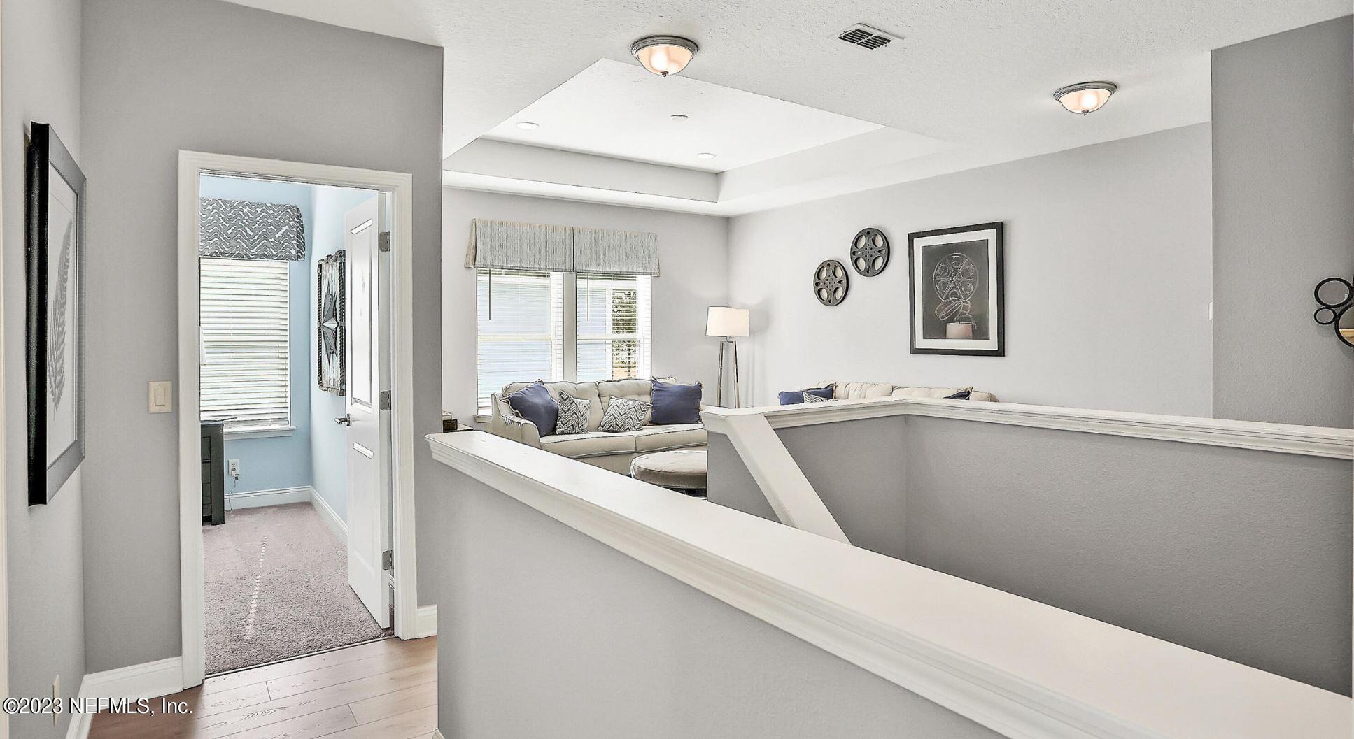 76 Archstone Way St. Augustine, FL 32092 - Photo 42 of 49 a view of living room and window