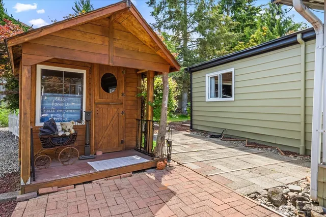 a view of house with chair and tables