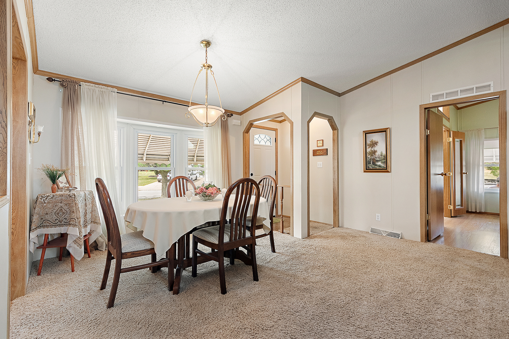 44 Petunia Circle Matteson, IL 60443 - Photo 4 of 20 a view of a a dining room with furniture window and wooden floor