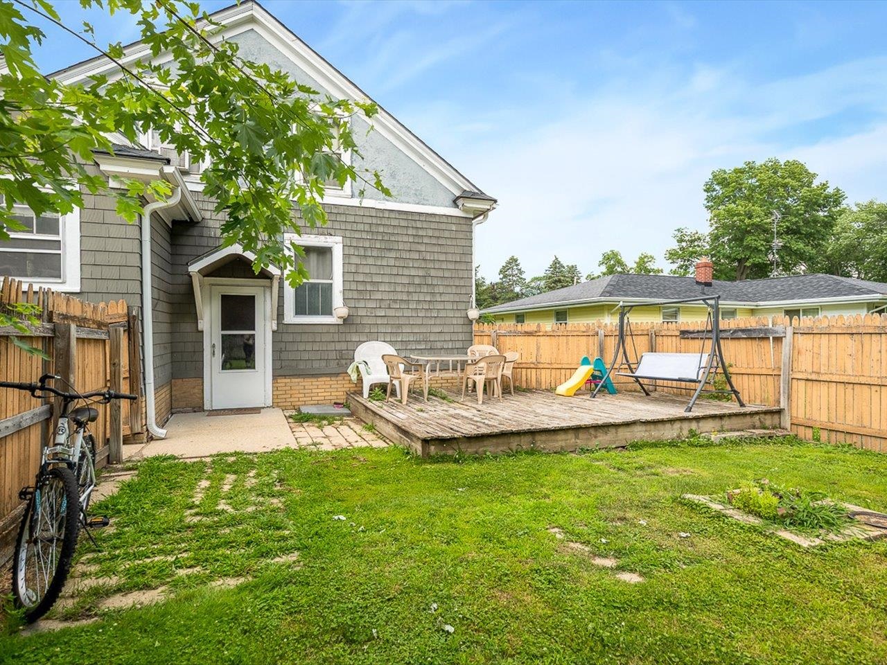 1247 West Logan Street Freeport, IL 61032 - Photo 26 of 34 a view of a house with backyard porch and sitting area