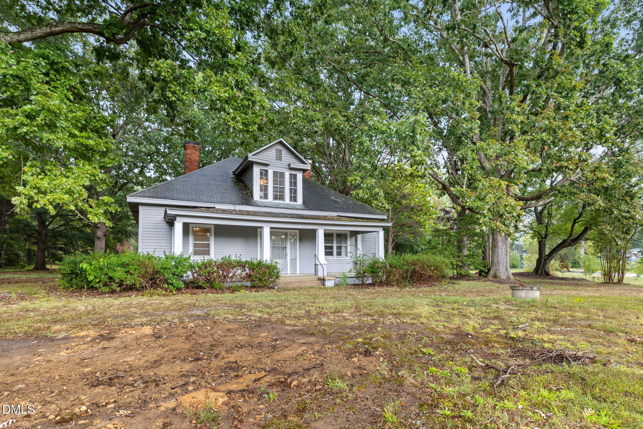 1089 Gillburg Road Henderson, NC 27537 - Photo 24 of 32 a front view of a house with a yard