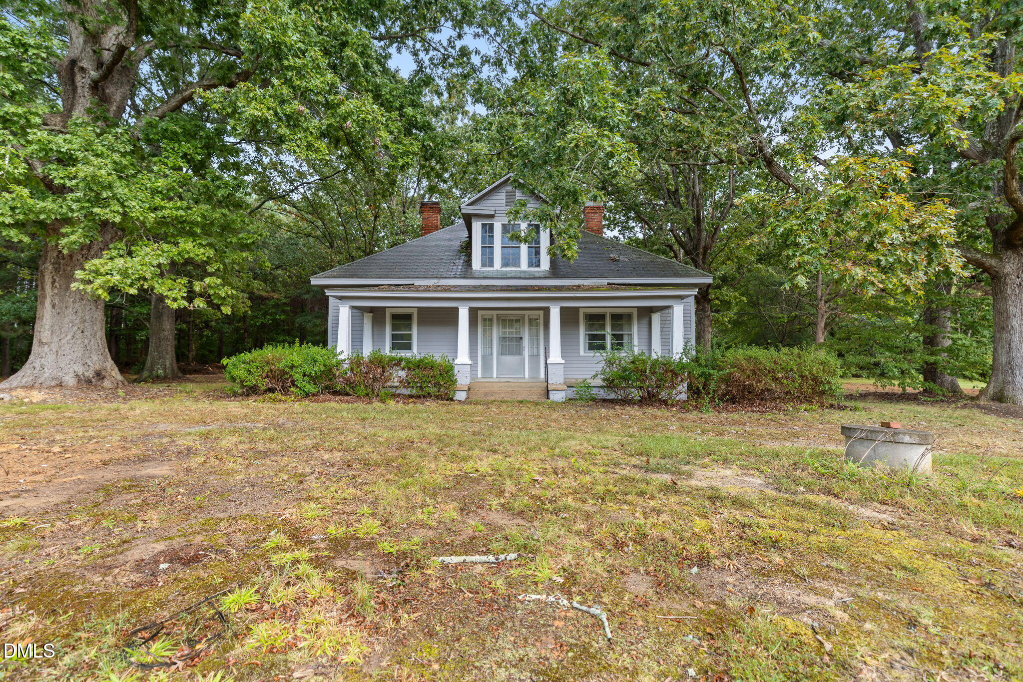 1089 Gillburg Road Henderson, NC 27537 - Photo 27 of 32 a front view of a house with a yard