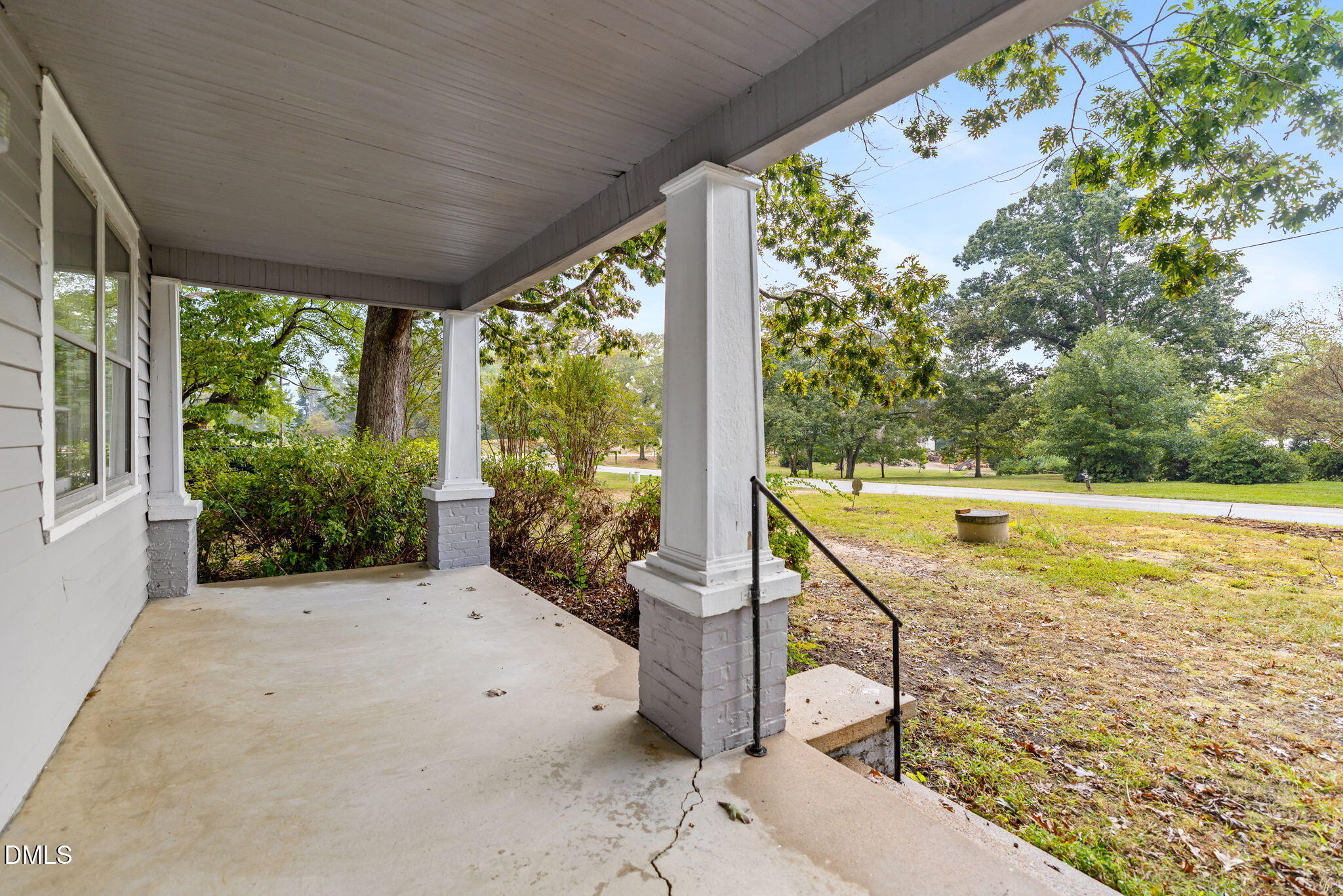 1089 Gillburg Road Henderson, NC 27537 - Photo 5 of 32 a view of a swimming pool with a porch