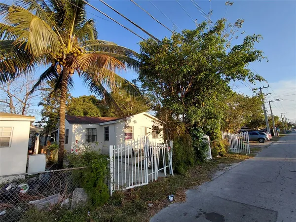 a view of a house with a street