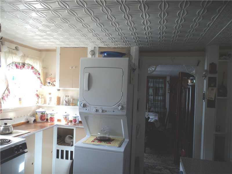 3 High Street Milo, ME 04463 - Photo 4 of 24 Kitchen. Kitchen looking toward...