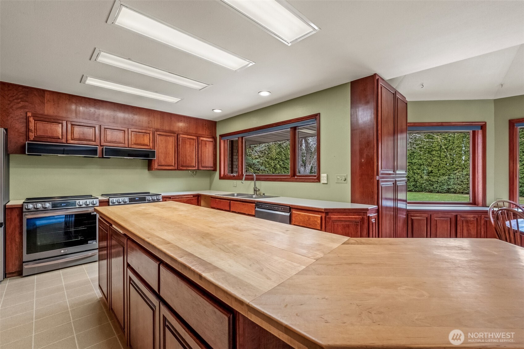 810 D Street Southwest Ephrata, WA 98823 - Photo 17 of 40 a kitchen with stainless steel appliances granite countertop a sink and a stove
