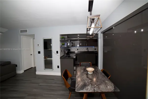 a view of dining room with wooden floor