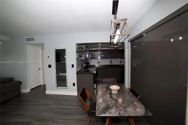 a view of dining room with wooden floor