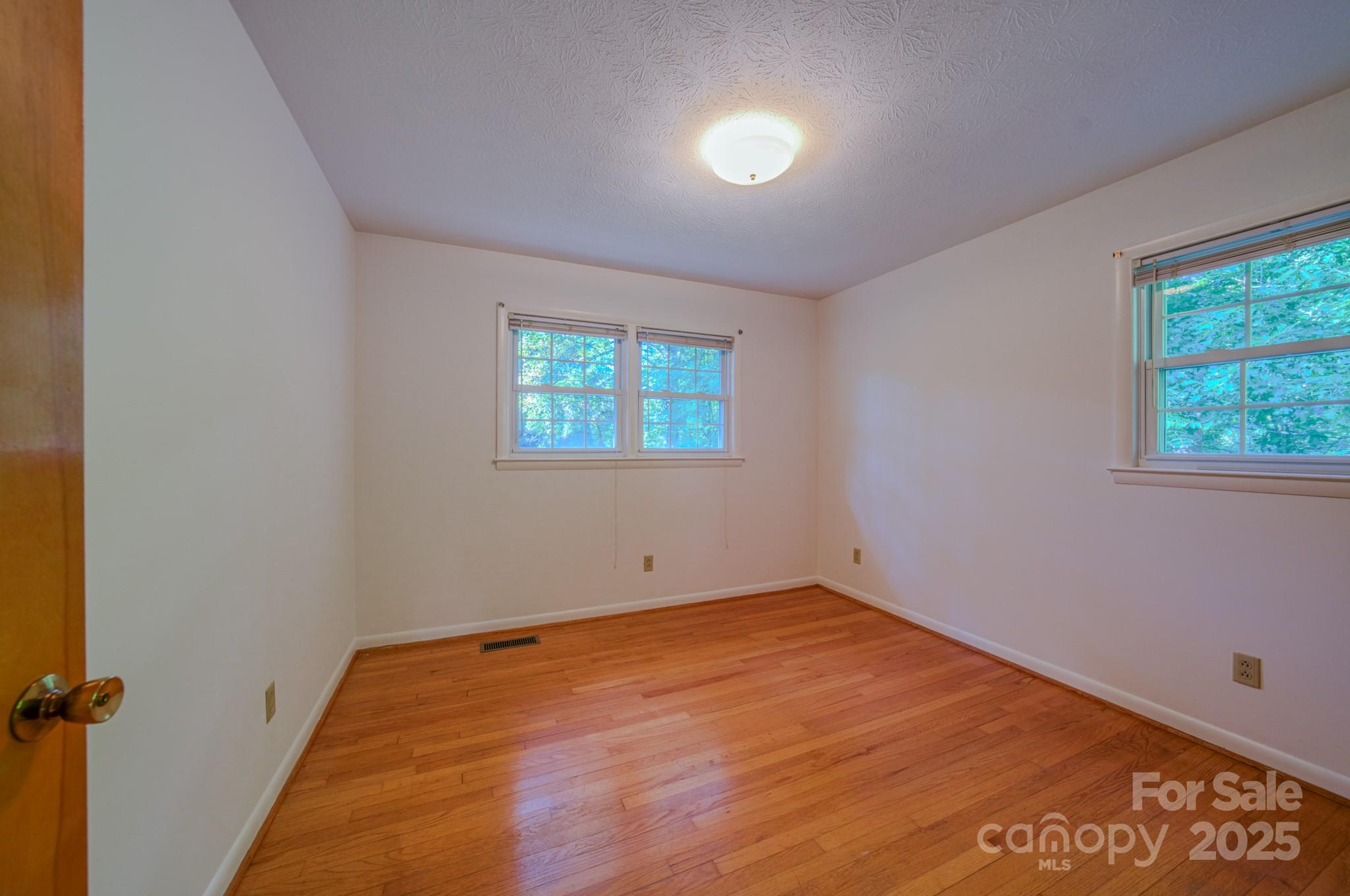 31 Jupiter Road Weaverville, NC 28787 - Photo 16 of 43 an empty room with windows