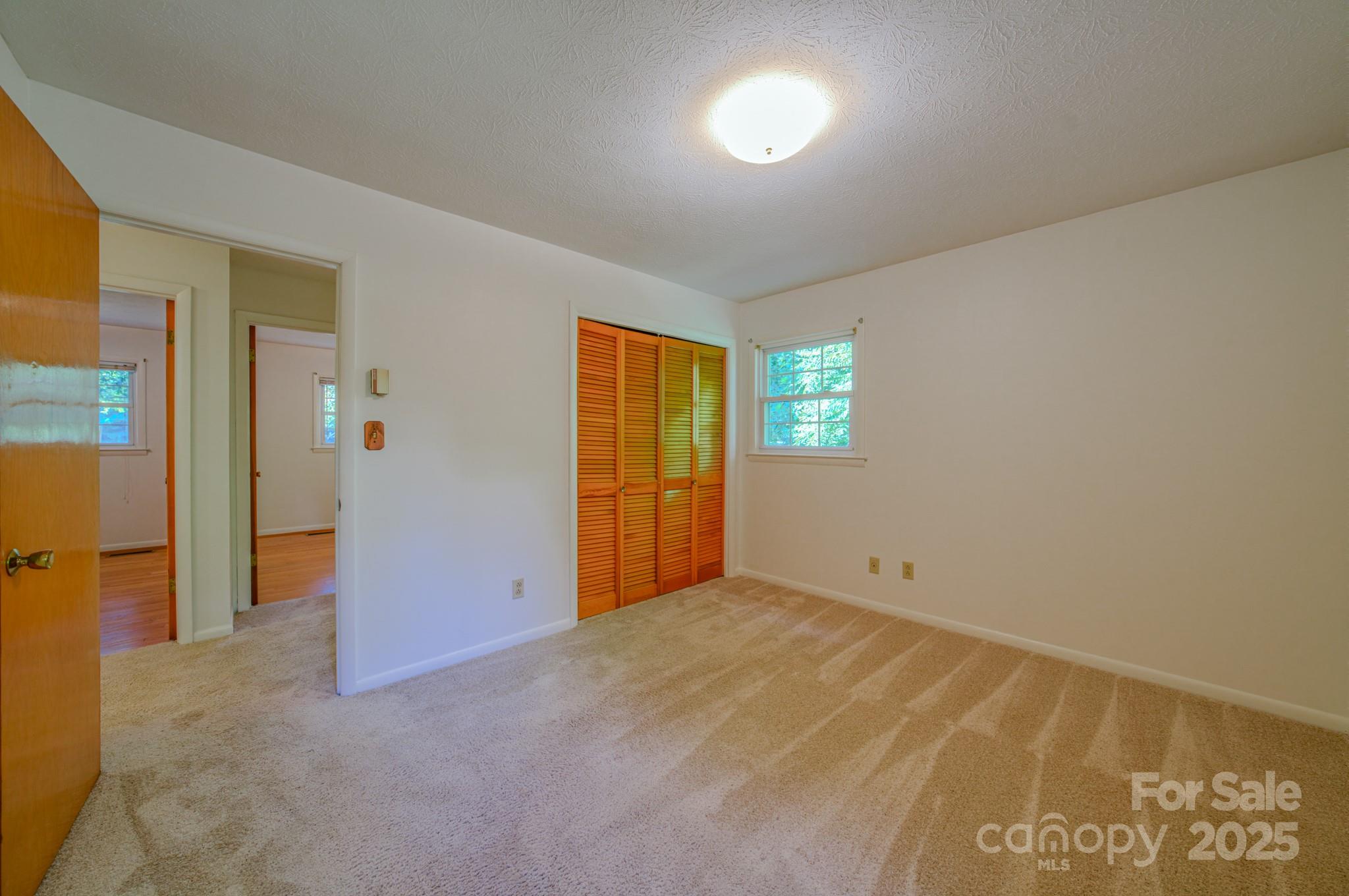 31 Jupiter Road Weaverville, NC 28787 - Photo 17 of 43 an empty room with windows