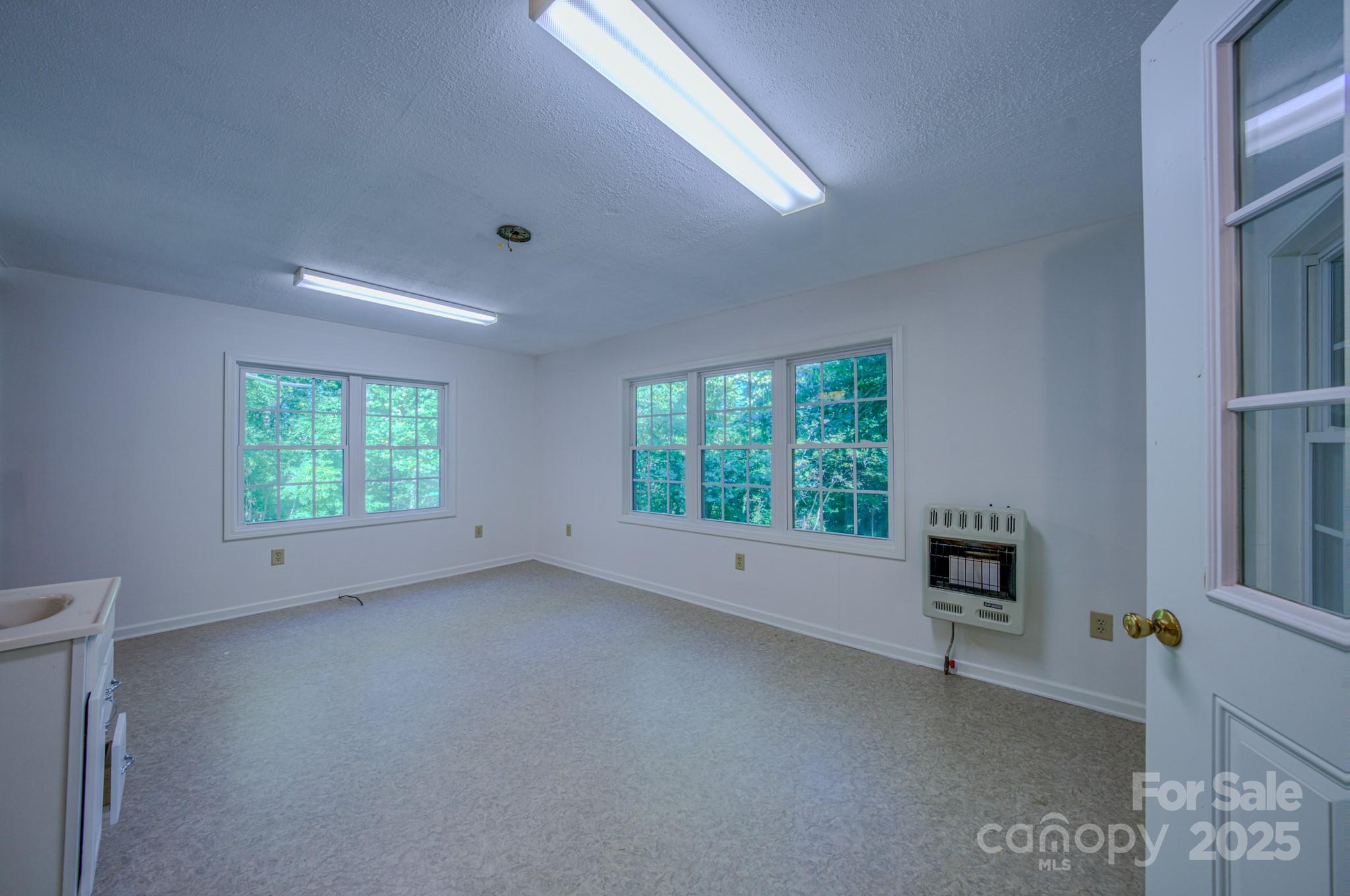 31 Jupiter Road Weaverville, NC 28787 - Photo 24 of 43 a view of room with window and outdoor view