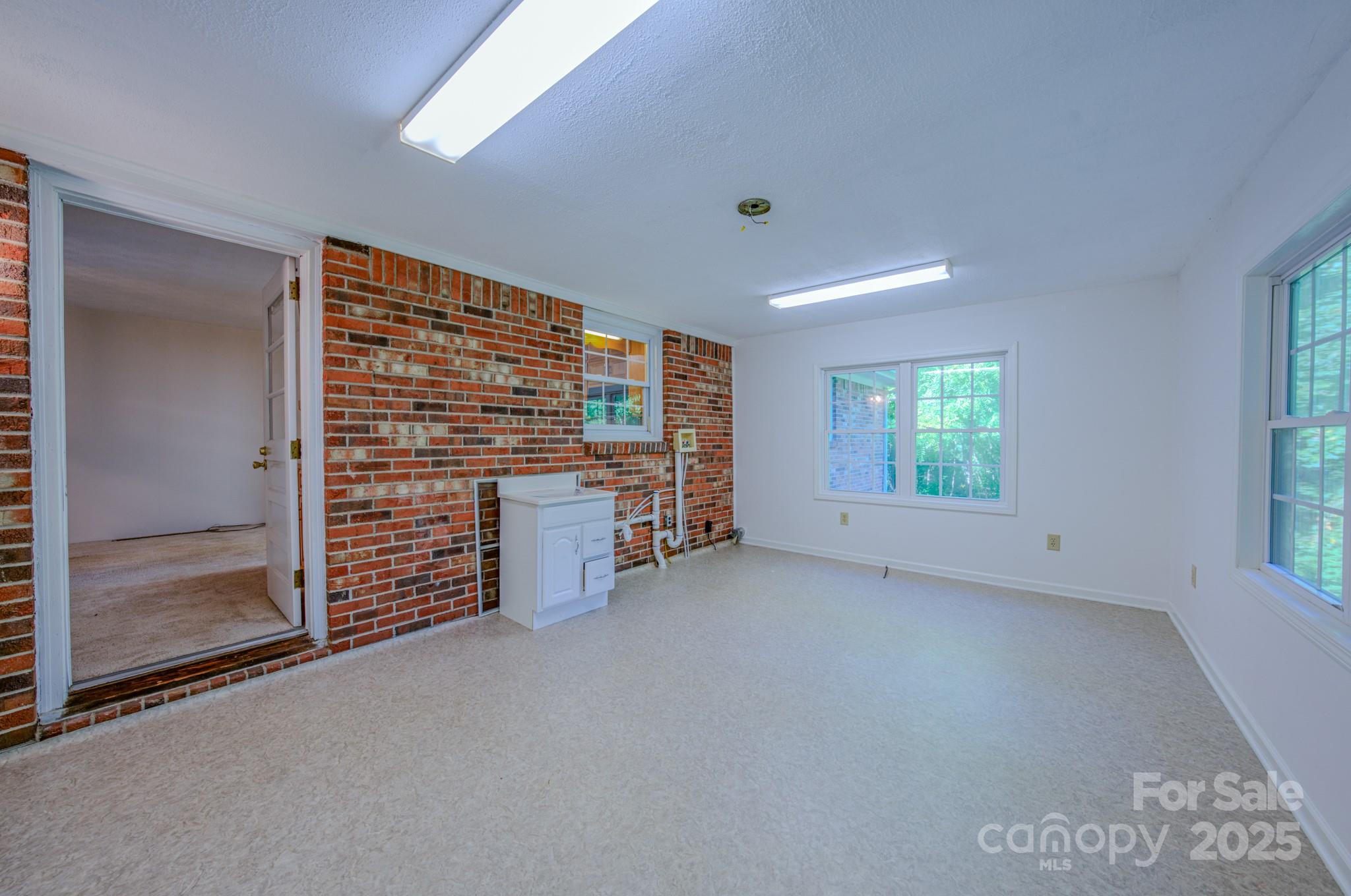31 Jupiter Road Weaverville, NC 28787 - Photo 25 of 43 a view of an empty room with a window