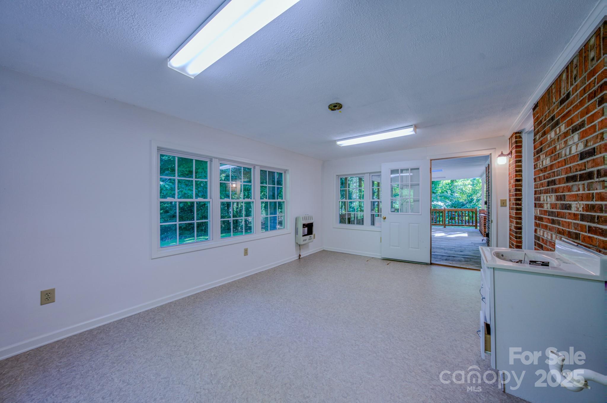 31 Jupiter Road Weaverville, NC 28787 - Photo 26 of 43 a view of an empty room with a window