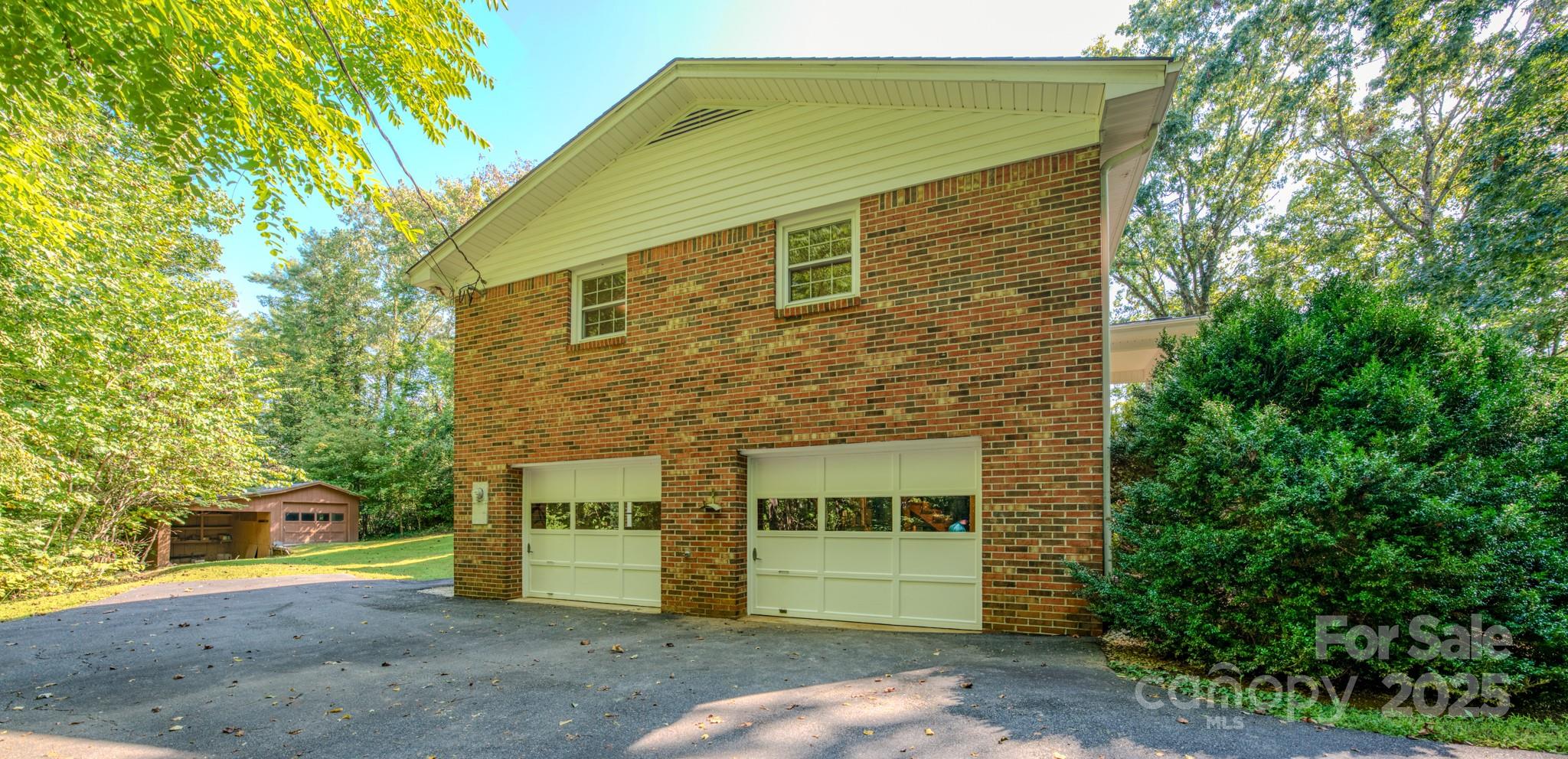 31 Jupiter Road Weaverville, NC 28787 - Photo 35 of 43 a front view of a house with a garage