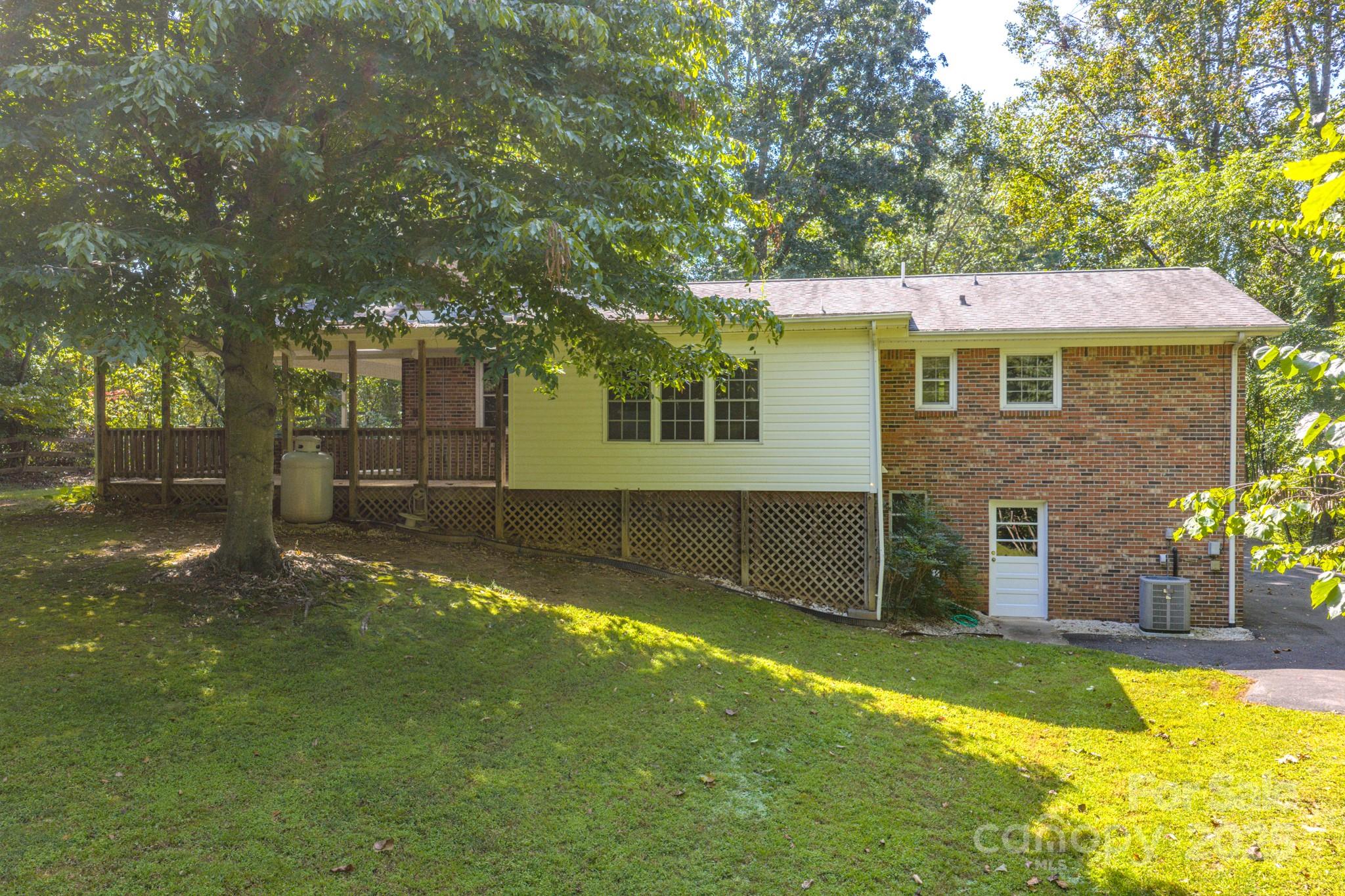 31 Jupiter Road Weaverville, NC 28787 - Photo 36 of 43 a view of a house with a swimming pool