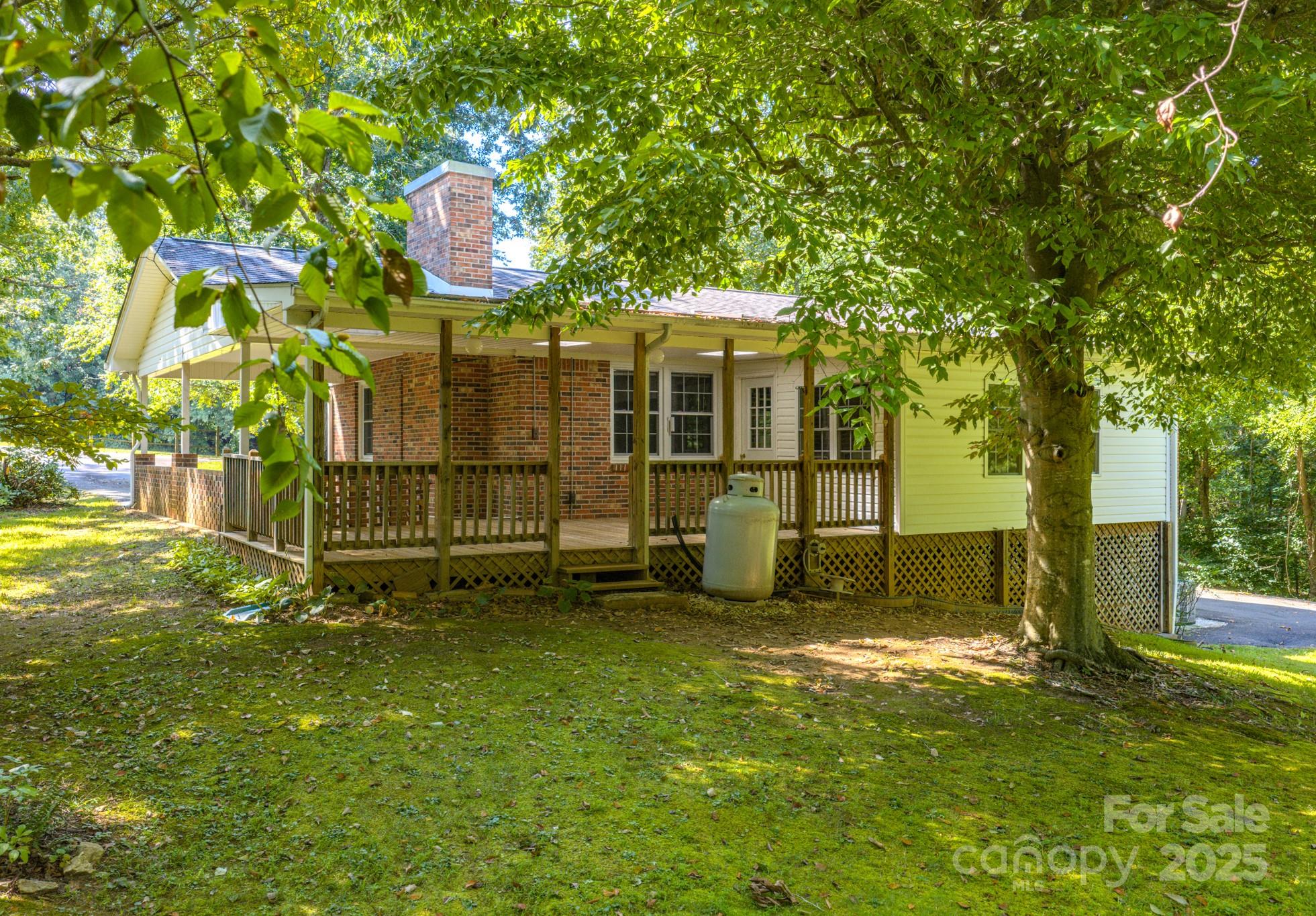 31 Jupiter Road Weaverville, NC 28787 - Photo 37 of 43 a view of a house with a yard