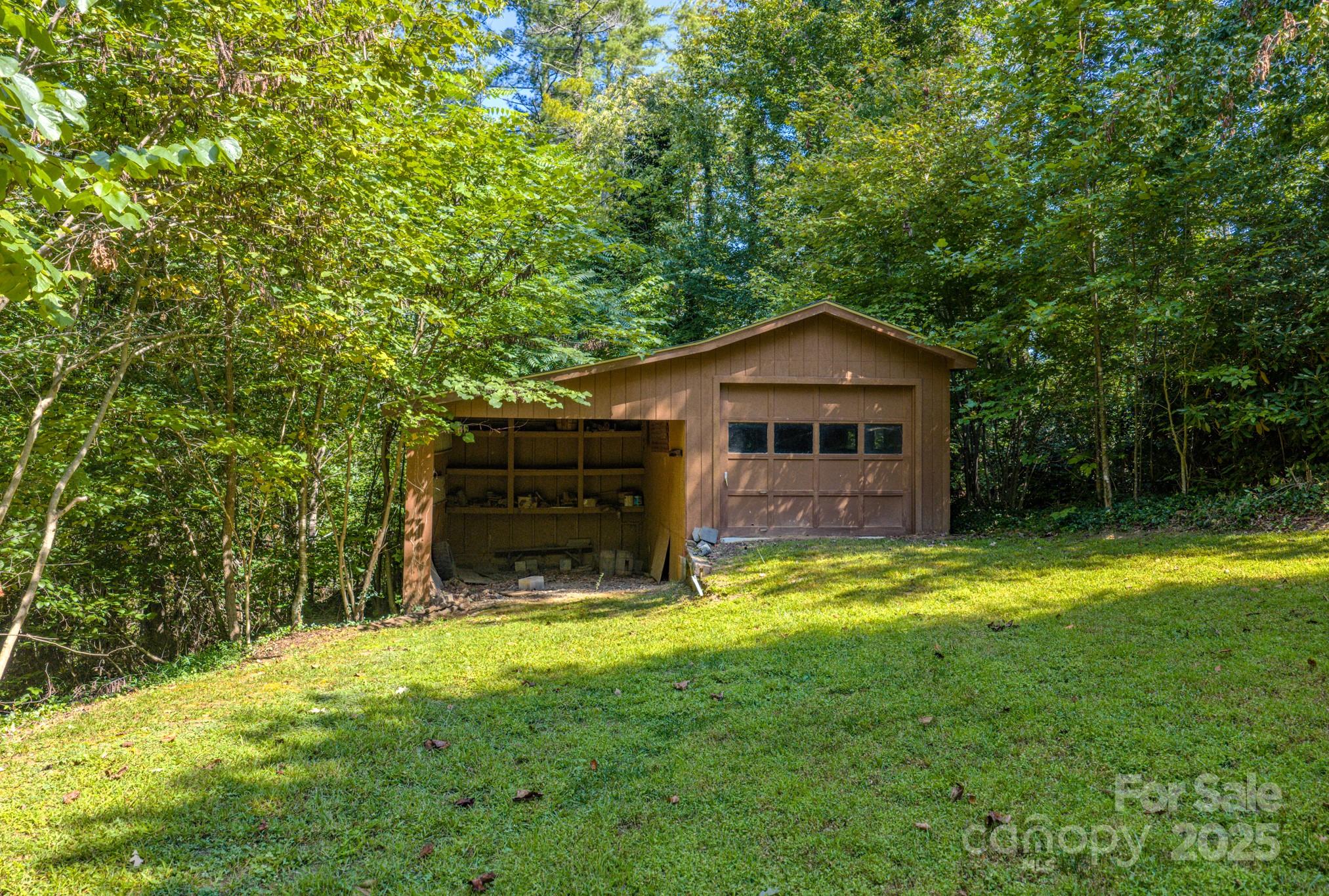31 Jupiter Road Weaverville, NC 28787 - Photo 41 of 43 a front view of a house with yard and green space