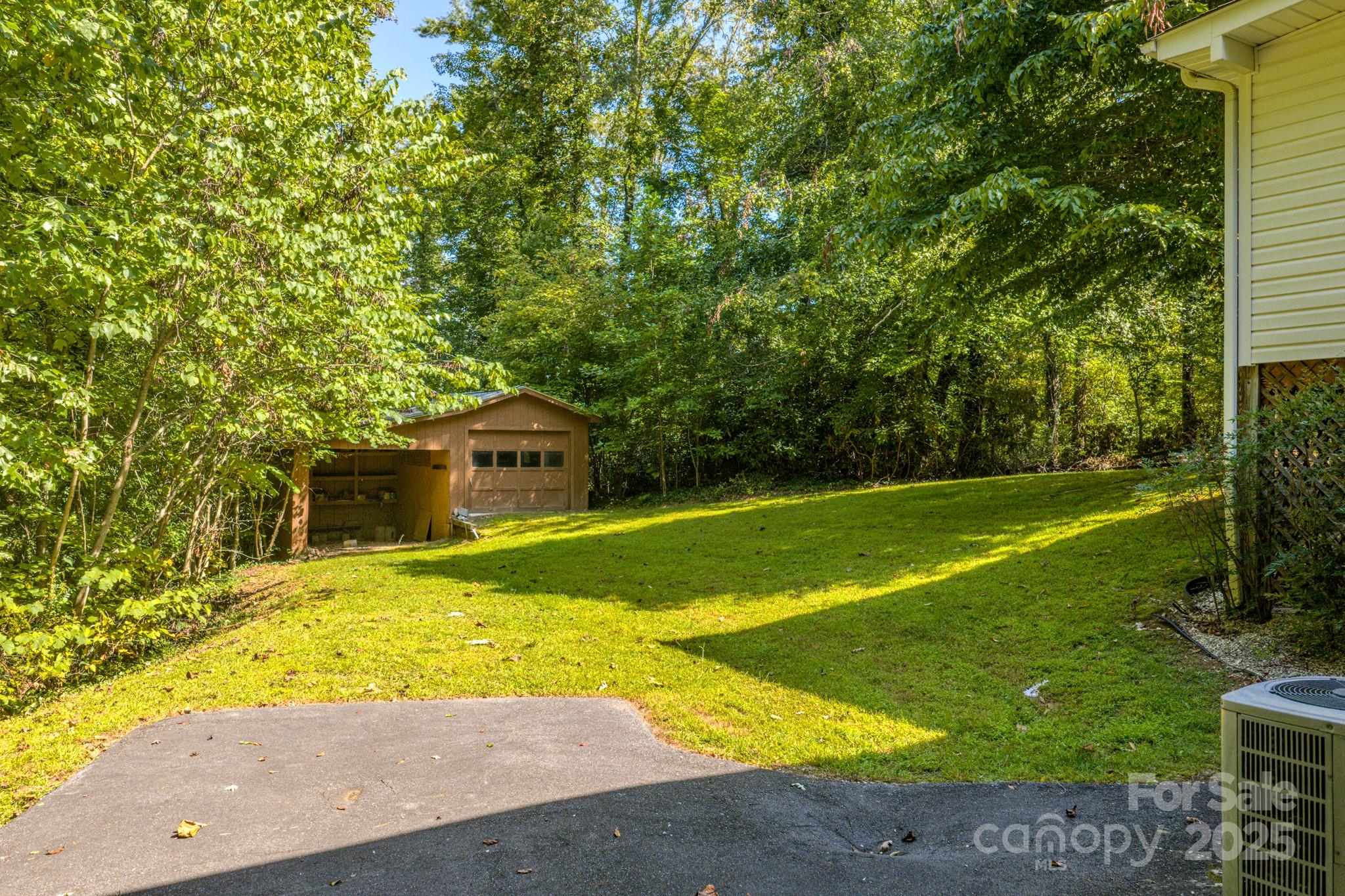 31 Jupiter Road Weaverville, NC 28787 - Photo 42 of 43 a view of a house with a yard