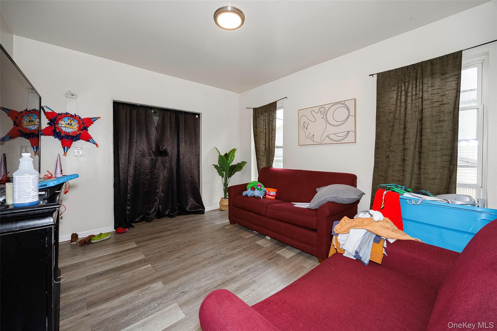 52 Parker Avenue Poughkeepsie, NY 12601 - Photo 4 of 12 a living room with furniture and a couch