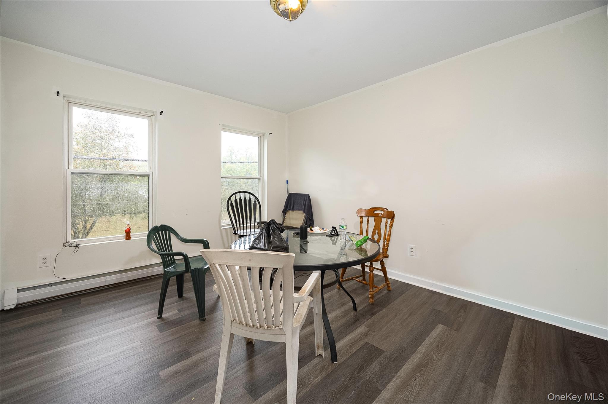 52 Parker Avenue Poughkeepsie, NY 12601 - Photo 5 of 12 a view of a dining room with furniture and wooden floor