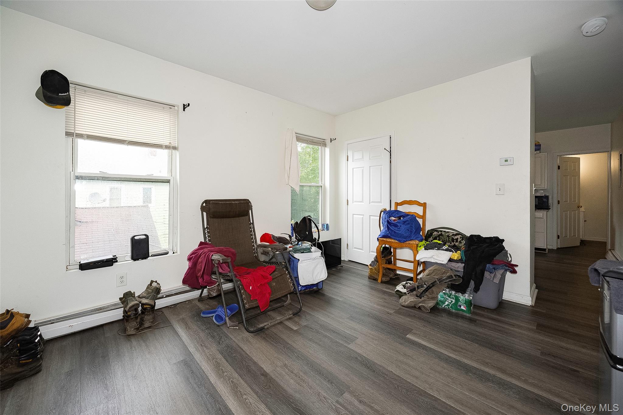 52 Parker Avenue Poughkeepsie, NY 12601 - Photo 6 of 12 a living room with furniture and a wooden floor