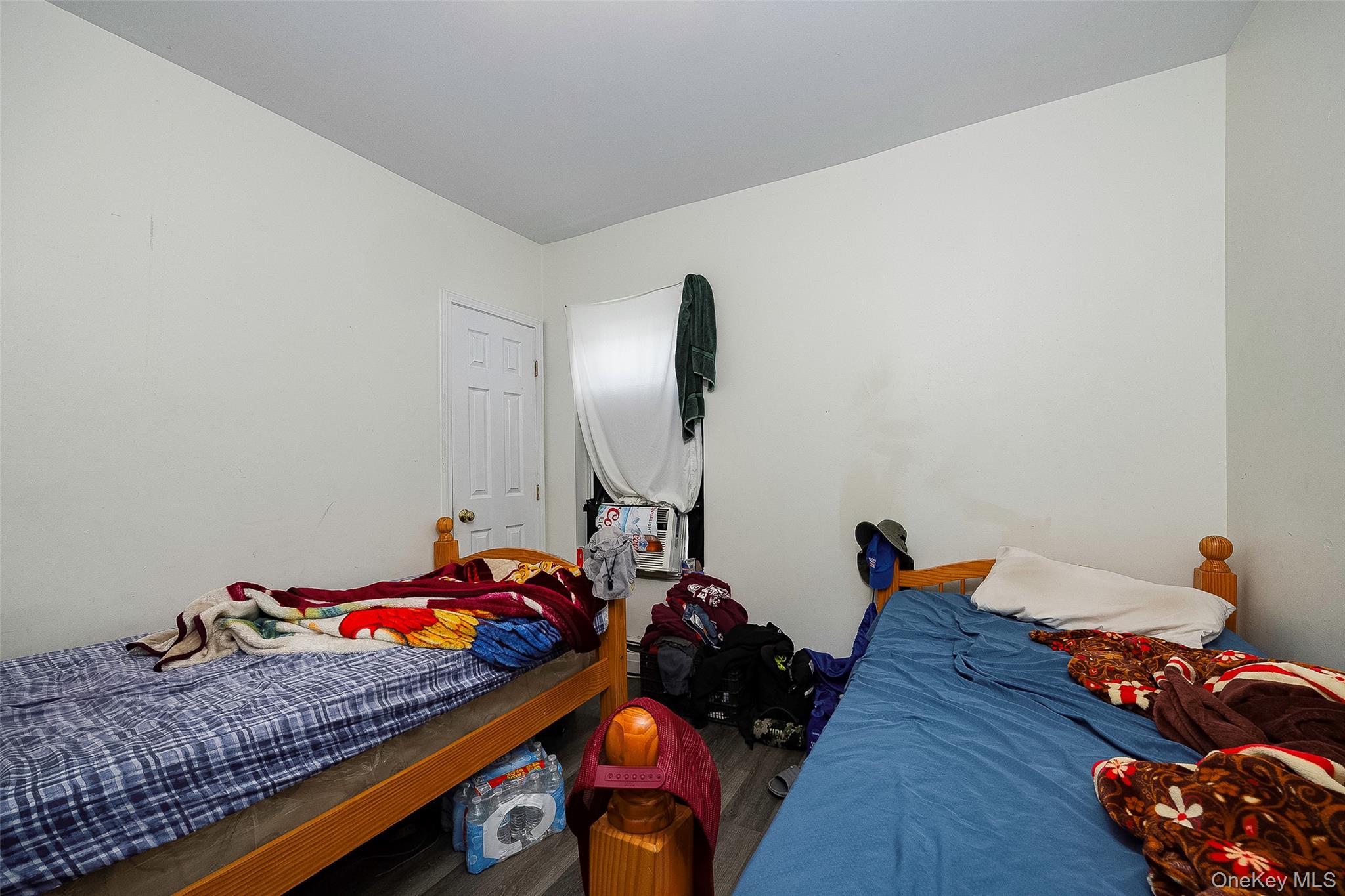 52 Parker Avenue Poughkeepsie, NY 12601 - Photo 8 of 12 a bed room with furniture and a couch