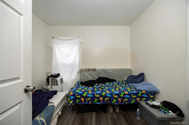 a room with toys and wooden floor